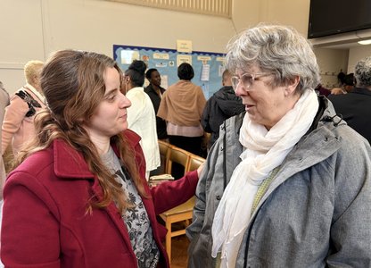 LCM Missionary Isabella speaking to Gill