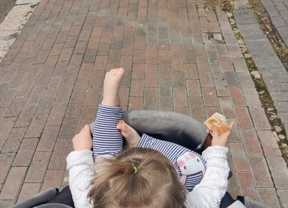 Laura Ashman with daughter in pram